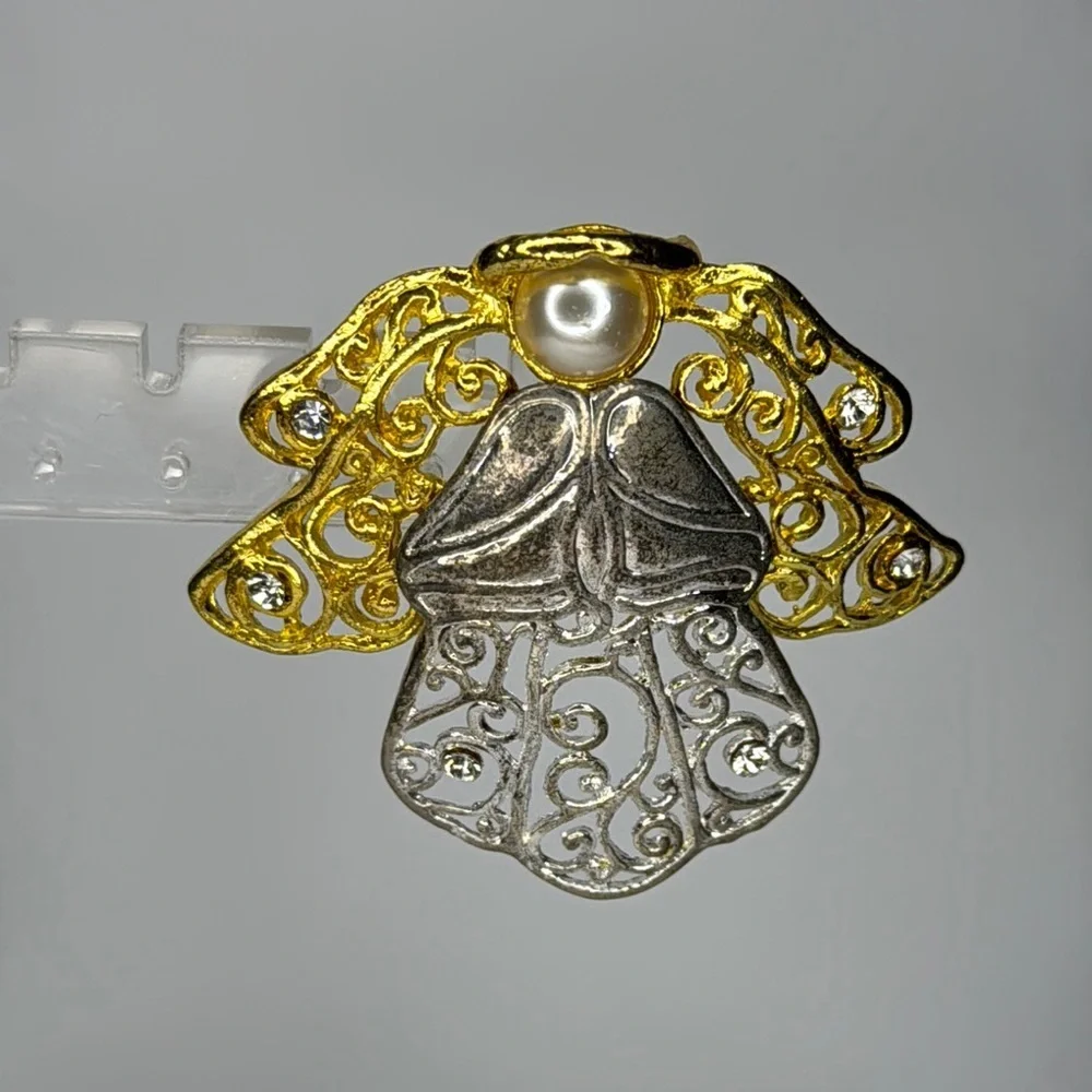 Elegant Gold and Silver Angel Brooch with Intricate Filigree